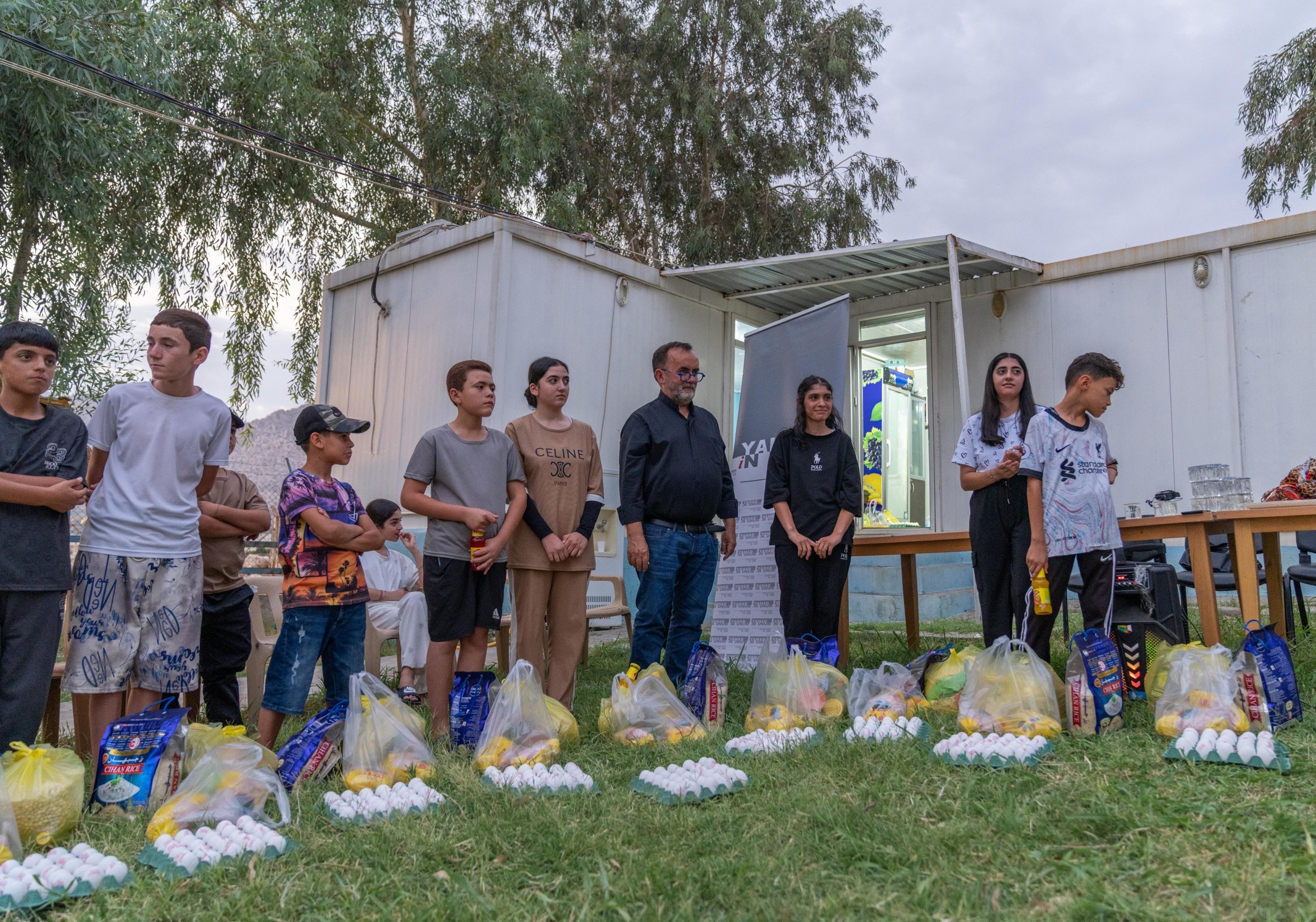 DISTRIBUTION OF FOOD AND HYGIENE KITS FOR ORPHANED CHILDREN IN A DISPLACEMENT CAMP